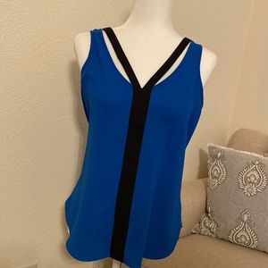 Sleeveless blouse, size M by Candie’s in a blue color